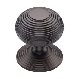 Heritage Brass Centre Door Knob Reeded Design 3 1/2 Matt Bronze Finish
UK Registered Design Number 6241152
 