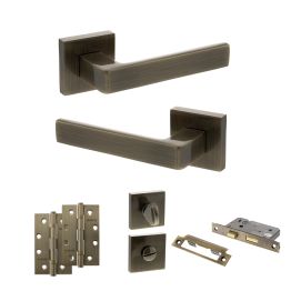 STATUS Montana Door Handle Pack (Bathroom Set - 2.5" CE Bathroom Lock, 4" Slim Knuckle Hinges x2) - Antique Brass