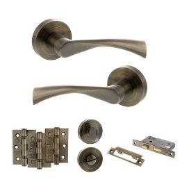 STATUS Colorado Door Handle Pack (Bathroom Set - 2.5" CE Bathroom Lock, 3" Fire Rated Hinges x3) - Antique Brass