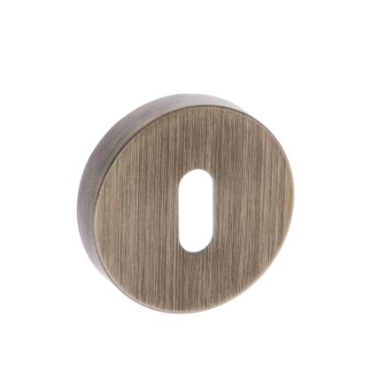 Forme Key Escutcheons on Minimal Round Rose - Yester Bronze