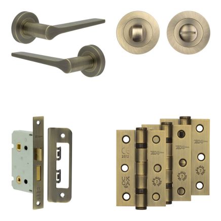 Complete Gio Door Handle Pack - Bathroom Lock (Standard Thumb Turn) - Antique Brass - 65mm / 3-inch Hinges - JE-E5B3-AB