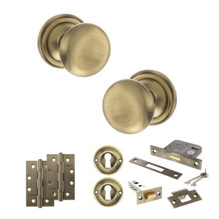 Old English Harrogate Door Knob Pack (Lock Set - 3" Latch & Deadlock, 4" Slim Knuckle Hinges x2) - Antique Brass