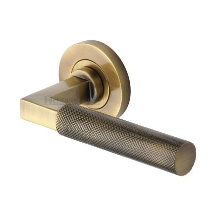 Heritage Brass Door Handle Lever on Rose Signac (Knurled Bauhaus) Design Antique Brass Finish