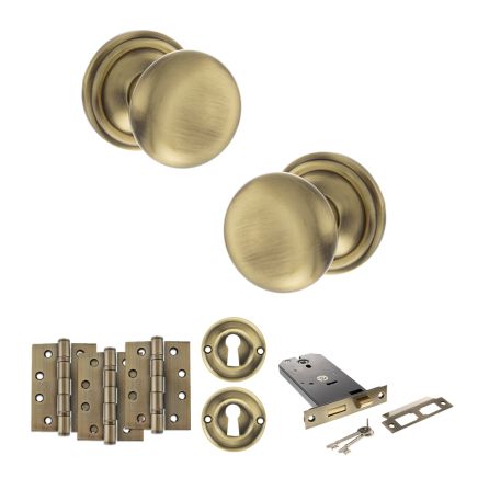 Old English Harrogate Door Knob Pack (Lock Set - Horizontal Sashlock, 4" Fire Rated Hinges x3) - Antique Brass