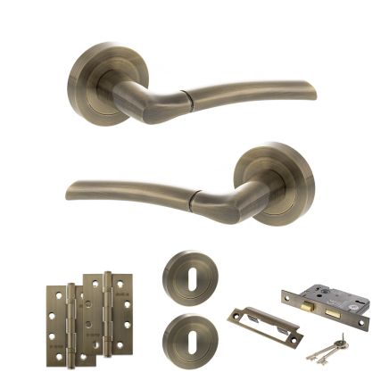 STATUS Indiana Door Handle Pack (3 Lever Lock Set - 2.5" CE Sashlock, 4" Slim Knuckle Hinges x2) - Antique Brass