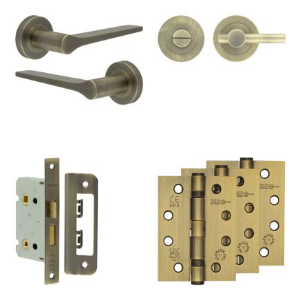 Complete Gio Door Handle Pack - Bathroom Lock (Plain Thumb Turn) - Antique Brass - 65mm / 4-inch Hinges - JE-E5A2-AB